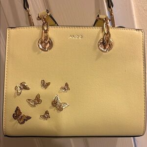 Aldo pale yellow and Gold Shoulder Bag with Butterfly Accents